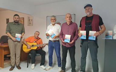 Promocija dvojezične zbirke pjesama pjesnika Valerija Orlića